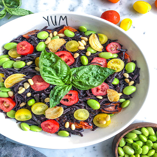 Black Rice Angel Hair Pasta with heirloom tomatoes and garlic sauce